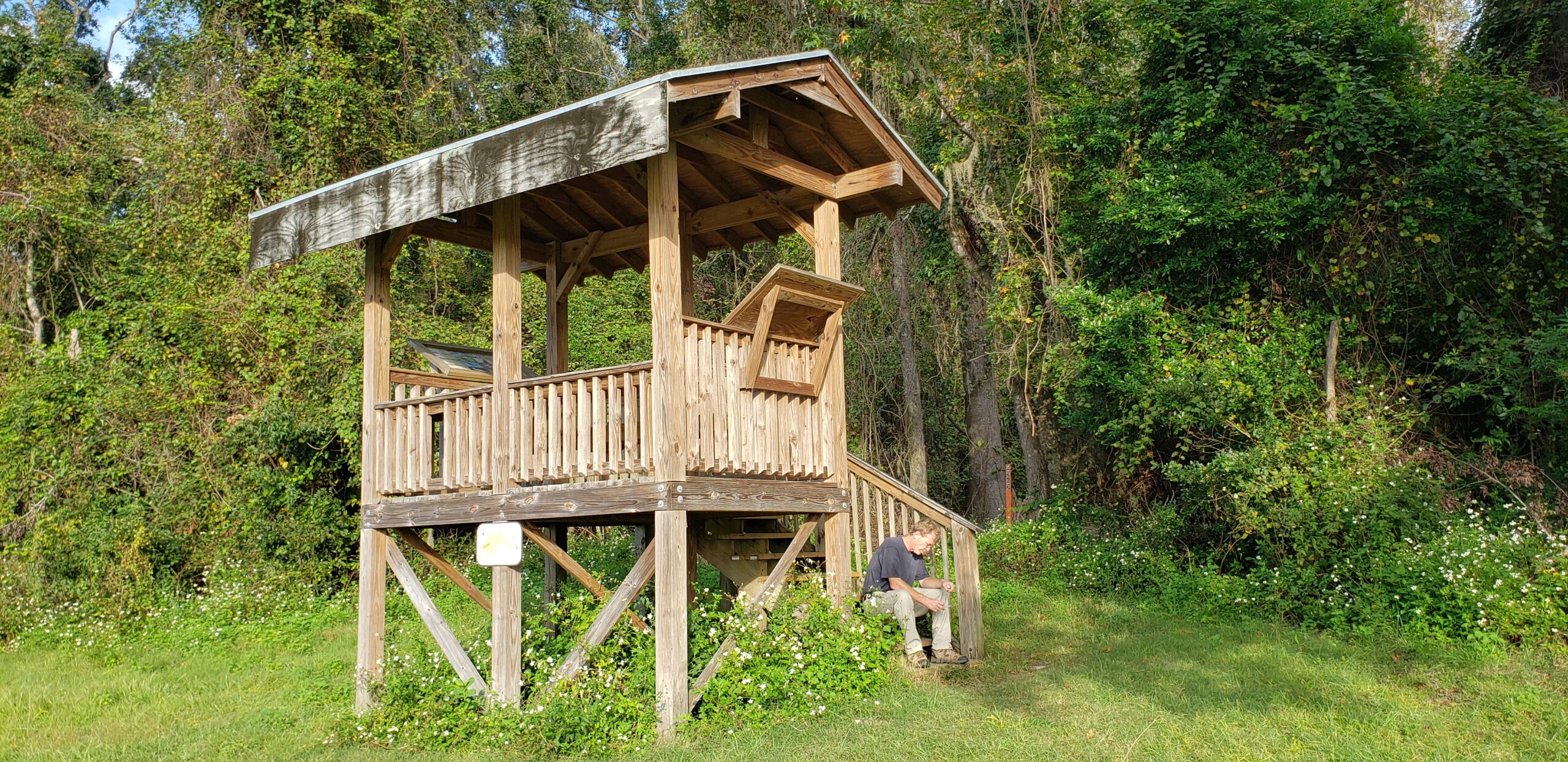 Photo is decorative and taken by a Tallahassee Realtor. It shows the shelter made of wood that can be found in Klapp Phipps park near the lake and the field used for horse trials.