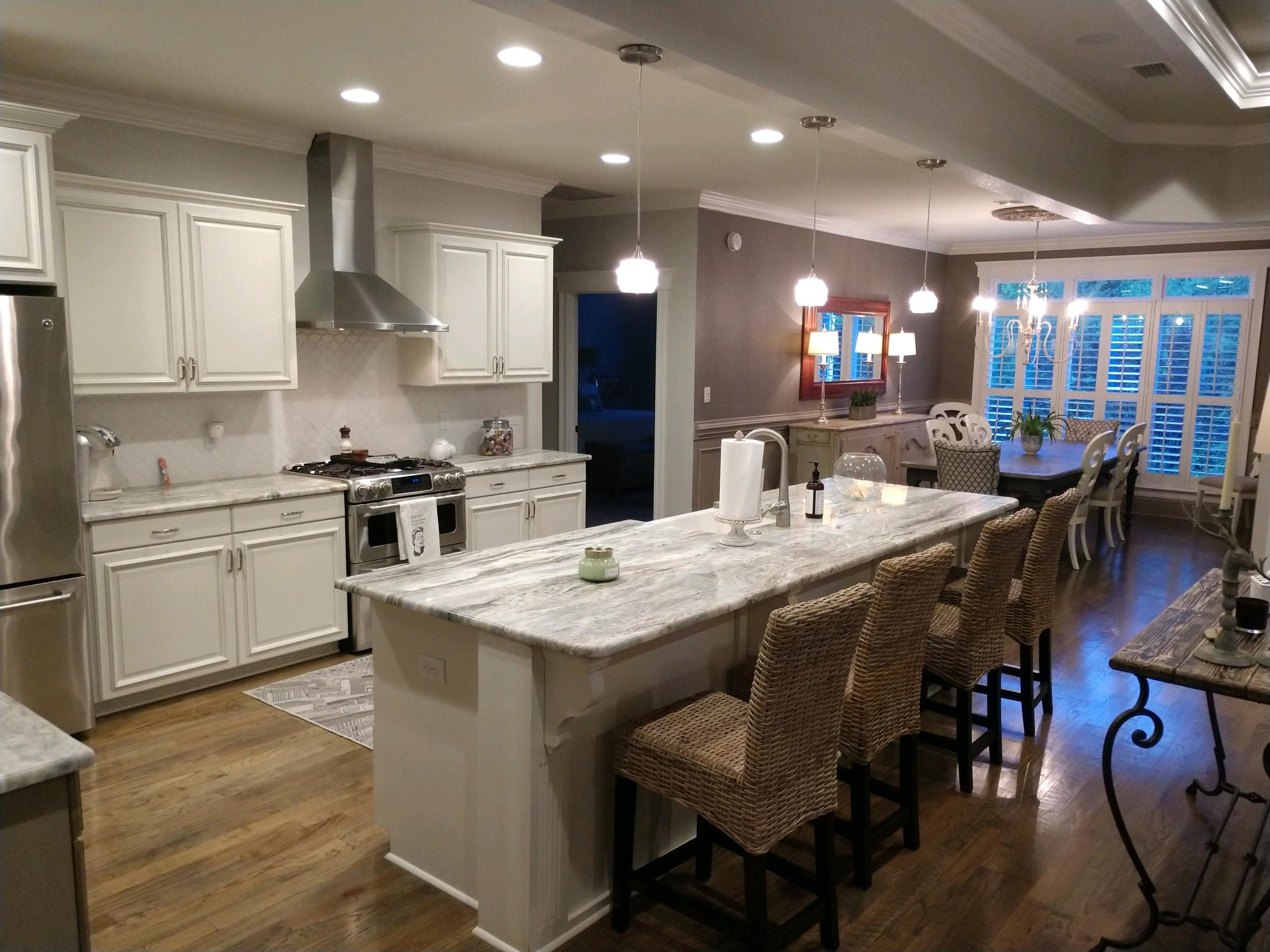Decorative picture showing a kitchen. Security cameras can be used to eavesdrop on conversations buyers have with their Tallahassee Realtor