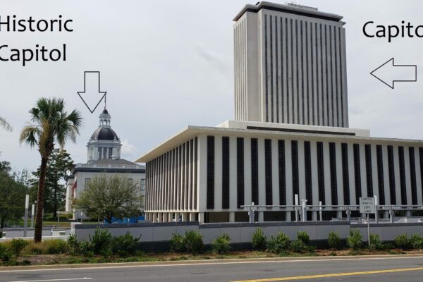 View from north of Capitol Plaza showing the Historic Capitol Museum and the current Capitol Bldg